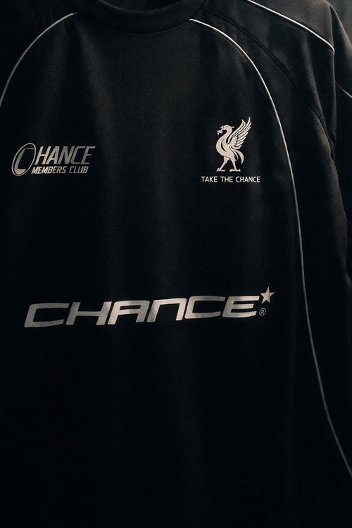 Black sweatshirt with 'Chance' branding on a dark background